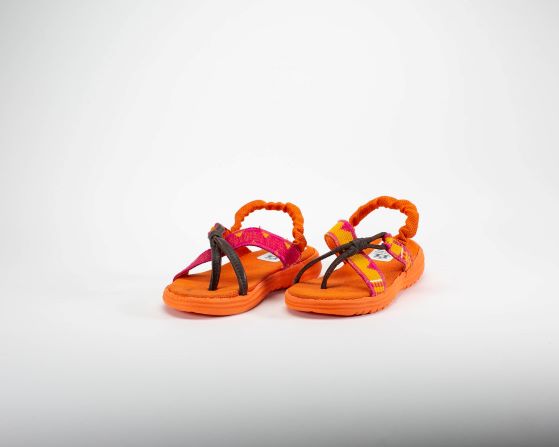 kids gya kente woven sandal. pink and orange