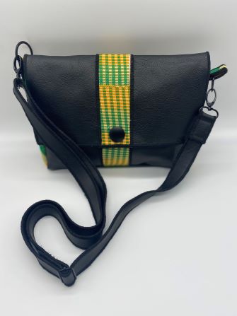 Green kente woven and black leather comb bag top view