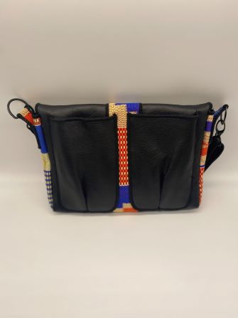 orange kente woven and black leather comb bag back view