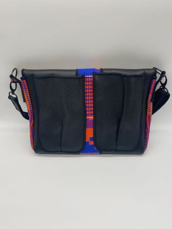 purple kente woven and black leather comb bag back view