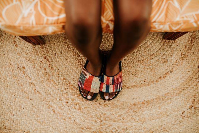 Women kente orange hand woven slid. Top view