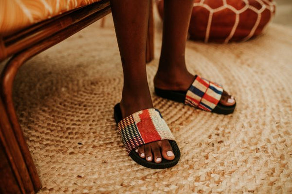 Women kente orange hand woven slid. Front view