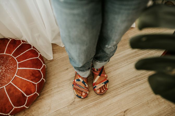 Women orange kente woven sandal with zipper on the side. Top view