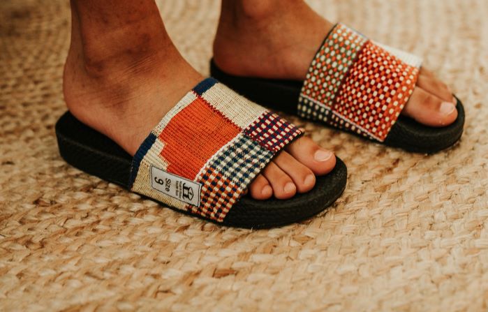 Men orange kente woven slid. Front view