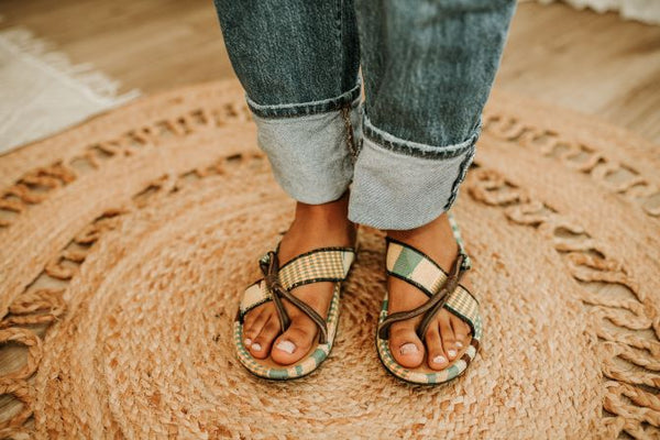 Women woven kente and leather sandal. Top view.