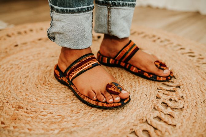 kente print sandal with toa for women. side view