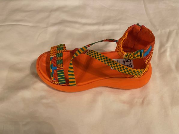 wedge yellow green print sandal for women side view with orange sole